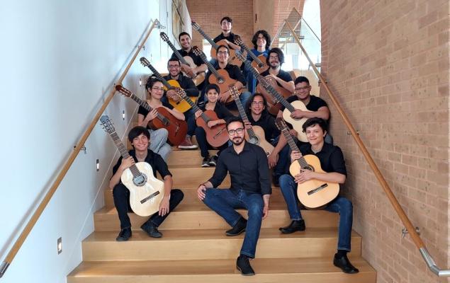 Students Holding Guitar